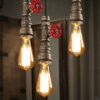Ceiling steampunk light with 3 lamps made of pipes in Industrial style